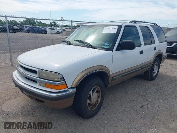 1999 Chevrolet Blazer Trailblazer z VIN 1GNDT13W4X2208791, wystawiony jako IAAI lot #42281876 z przebiegiem 261 605 mil mil oraz . Historia ofert i sprzedaży dostępna na DreamBid. Obrazek 2.