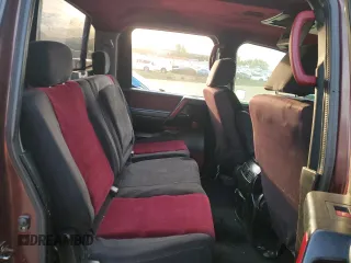 2005 Nissan Titan XE with VIN 1N6AA07A15N556079, listed as a Copart auction lot 48419495 with Not Provided miles and Salvage Title. Bid and sale history available at DreamBid. Image 10.