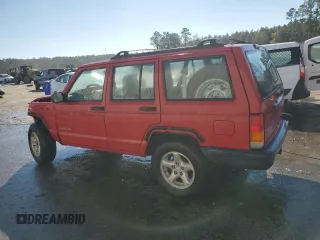 1999 Jeep Cherokee SE with VIN 1J4FT28S6XL515896, listed as a Copart auction lot 83745444 with 192,406 mi miles and Salvage title. Bid and sale history available at DreamBid. Image 2.