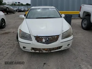 2005 Acura RL z VIN JH4KB16515C020791, wystawiony jako Copart lot #59802735 z przebiegiem Nie podano mil oraz Szkoda całkowita • Salvage title. Historia ofert i sprzedaży dostępna na DreamBid. Obrazek 5.