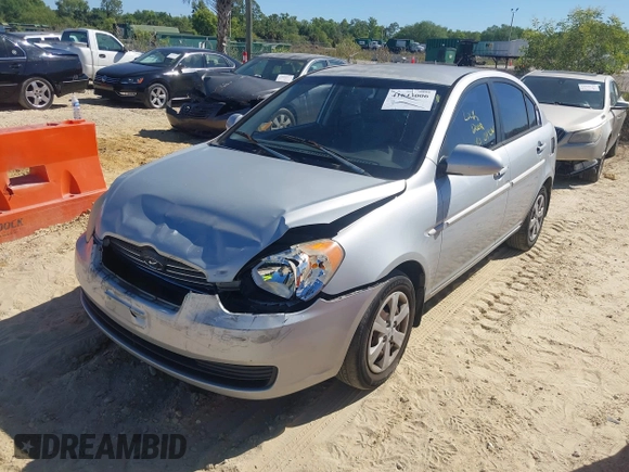2008 Hyundai Accent GLS with VIN KMHCN46CX8U214890, listed as a IAAI auction lot 41843006 with 179,550 mi miles. Bid and sale history available at carsss.com. Image 17.