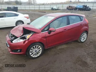 2017 Ford Fiesta Titanium with VIN 3FADP4FJ9HM102397, listed as a Copart auction lot 80921684 with 106,011 mi miles and Salvage Title. Bid and sale history available at DreamBid. Image 1.