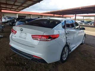 2016 Kia Optima LX with VIN 5XXGT4L3XGG119847, listed as a IAAI auction lot 41789193 with 62,804 mi miles. Bid and sale history available at carsss.com. Image 4.