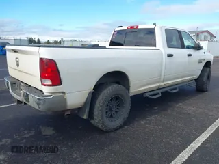 2013 Ram 2500 SLT with VIN 3C6TR5JT5DG517635, listed as a IAAI auction lot 40950960 with 99,372 mi miles and . Bid and sale history available at DreamBid. Image 4.