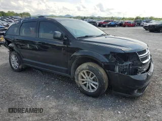 2017 Dodge Journey SXT with VIN 3C4PDCBB9HT576994, listed as a Copart auction lot 60420175 with 115,257 mi miles and Salvage title. Bid and sale history available at DreamBid. Image 4.