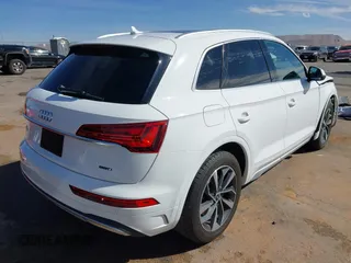 2021 Audi Q5 Premium Plus with VIN WA1BAAFYXM2125942, listed as a IAAI auction lot 41671026 with 63,804 mi miles. Bid and sale history available at carsss.com. Image 4.