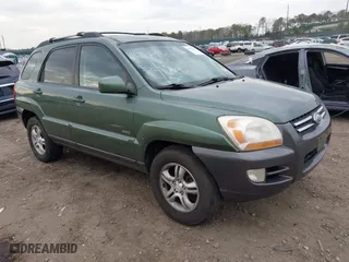 2007 Kia Sportage LX with VIN KNDJE723277359843, listed as a IAAI auction lot 41903253 with 233,037 mi miles. Bid and sale history available at carsss.com. Image 1.