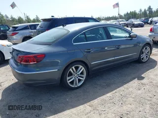 2014 Volkswagen CC Lux with VIN WVWRP7AN7EE501483, listed as a IAAI auction lot 42090985 with 121,737 mi miles. Bid and sale history available at carsss.com. Image 4.
