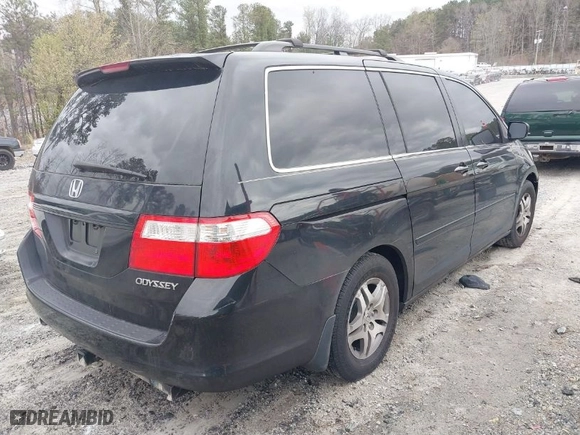 2005 Honda Odyssey EX-L with VIN 5FNRL38745B130034, listed as a IAAI auction lot 41800841 with 266,620 mi miles. Bid and sale history available at carsss.com. Image 4.