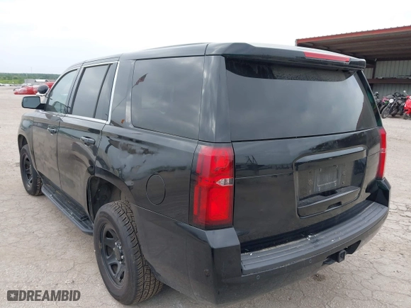 2019 Chevrolet Tahoe Commercial with VIN 1GNLCDECXKR231072, listed as a IAAI auction lot 41800007 with 100,101 mi miles. Bid and sale history available at carsss.com. Image 3.