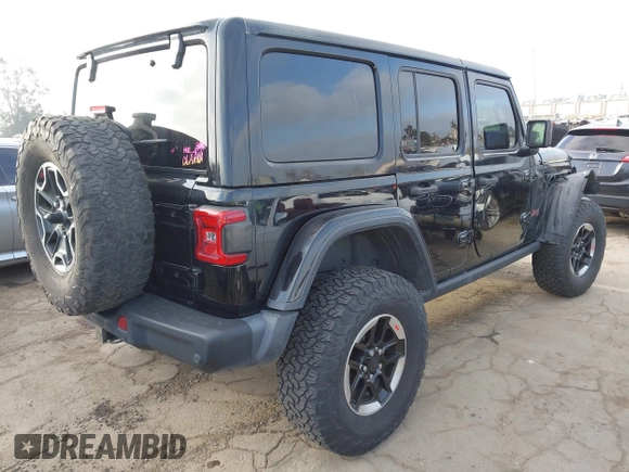 2020 Jeep Wrangler Unlimited Rubicon with VIN 1C4HJXFG1LW141335, listed as a IAAI auction lot 42724973 with 59,843 mi miles and . Bid and sale history available at DreamBid. Image 4.