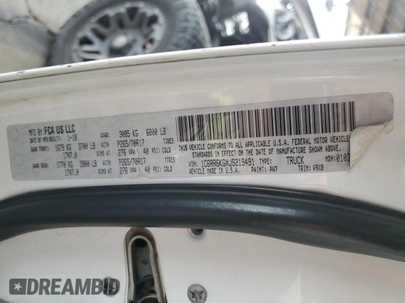2018 Ram 1500 Tradesman with VIN 1C6RR6KGXJS219491, listed as a Copart auction lot 52093895 with 212,925 mi miles and Salvage title. Bid and sale history available at DreamBid. Image 12.