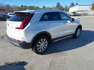 2022 Cadillac XT4 AWD Premium Luxury with VIN 1GYFZDR41NF105299, listed as a IAAI auction lot 41257154 with 34,904 mi miles and . Bid and sale history available at carsss.com. Image 4.