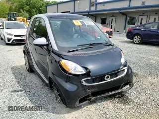 2013 Smart fortwo Pure with VIN WMEEJ3BA9DK670264, listed as a Copart auction lot 52817215 with 51,434 mi miles and Salvage Title. Bid and sale history available at DreamBid. Image 11.