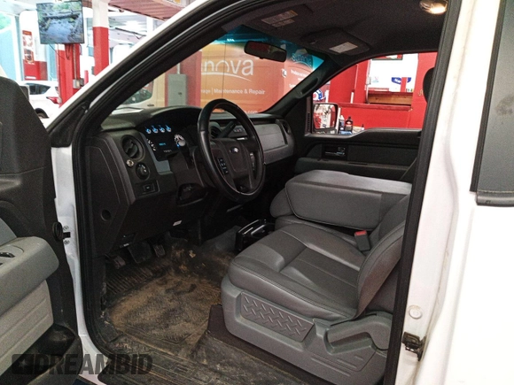 2014 Ford F-150 XL with VIN 1FTMF1CM2EKE59420, listed as a IAAI auction lot 42819177 with 57,030 mi miles and . Bid and sale history available at DreamBid. Image 9.