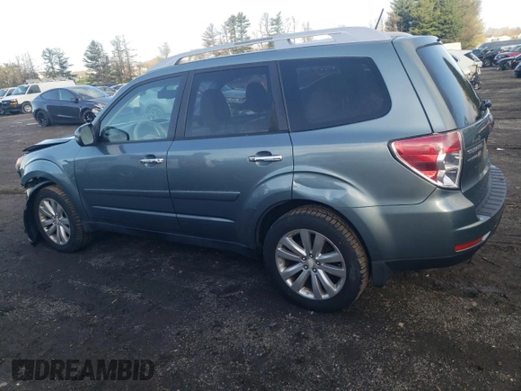 2011 Subaru Forester 2.5X Touring with VIN JF2SHAGCXBH752902, listed as a Copart auction lot 52102625 with 151,799 mi miles and Salvage Title. Bid and sale history available at carsss.com. Image 2.