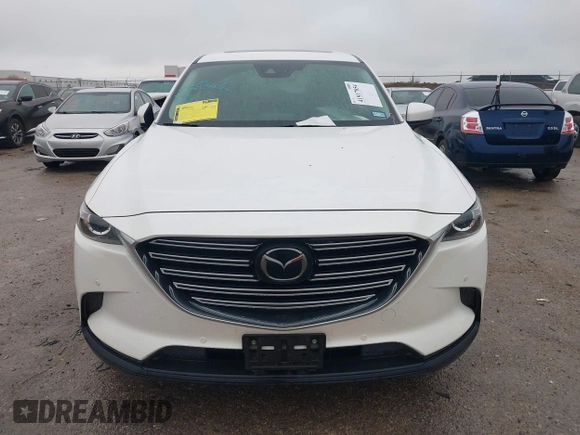 2019 Mazda CX-9 Touring with VIN JM3TCACY2K0328347, listed as a IAAI auction lot 41917854 with 67,173 mi miles and . Bid and sale history available at DreamBid. Image 12.