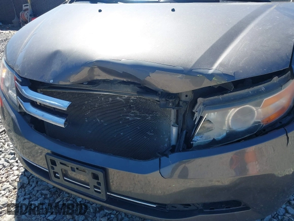 2014 Honda Odyssey EX-L with VIN 5FNRL5H61EB014695, listed as a IAAI auction lot 41694860 with 261,265 mi miles and . Bid and sale history available at DreamBid. Image 6.