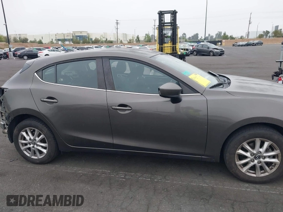 2015 Mazda 3 i Touring with VIN JM1BM1L7XF1261134, listed as a IAAI auction lot 42164554 with 130,570 mi miles and . Bid and sale history available at DreamBid. Image 14.