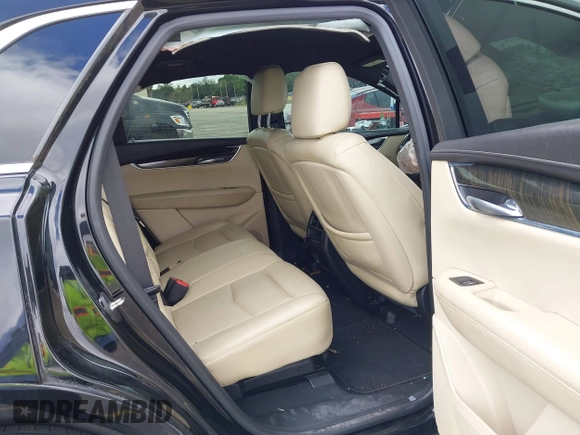 2018 Cadillac XT5 FWD z VIN 1GYKNARS3JZ137039, wystawiony jako IAAI lot #41667581 z przebiegiem 98 281 mil mil oraz . Historia ofert i sprzedaży dostępna na DreamBid. Obrazek 8.