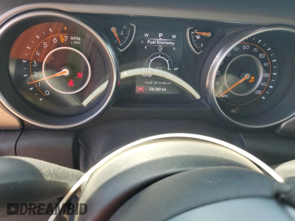 2020 Jeep Wrangler Sport with VIN 1C4GJXAG9LW203468, listed as a Copart auction lot 63586585 with 58,180 mi miles and Salvage title. Bid and sale history available at DreamBid. Image 9.
