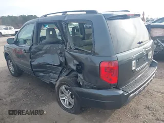 2004 Honda Pilot EX with VIN 2HKYF184X4H590442, listed as a IAAI auction lot 40968680 with 224,892 mi miles. Bid and sale history available at carsss.com. Image 3.