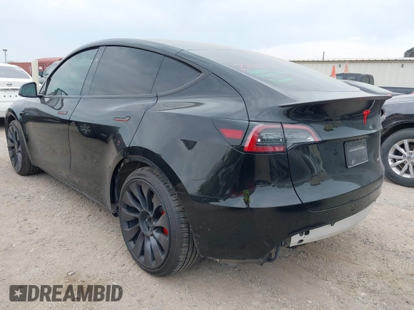 2024 Tesla Model Y Performance z VIN 7SAYGDEF7RA267752, wystawiony jako IAAI lot #42126456 z przebiegiem 21 216 mil mil oraz . Historia ofert i sprzedaży dostępna na DreamBid. Obrazek 3.