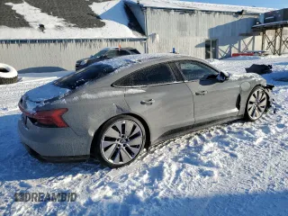 2022 Audi e-tron GT Prestige z VIN WAUEJBFW6N7007945, wystawiony jako Copart lot #45677315 z przebiegiem 32 372 mil mil oraz Nie do naprawy. Historia ofert i sprzedaży dostępna na DreamBid. Obrazek 3.
