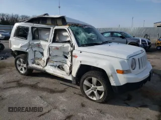 2014 Jeep Patriot Latitude with VIN 1C4NJRFB4ED892754, listed as a Copart auction lot 46517945 with 161,042 mi miles and Salvage title. Bid and sale history available at DreamBid. Image 4.