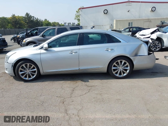 2014 Cadillac XTS Luxury with VIN 2G61N5S30E9294994, listed as a IAAI auction lot 42617654 with 159,573 mi miles and . Bid and sale history available at DreamBid. Image 15.