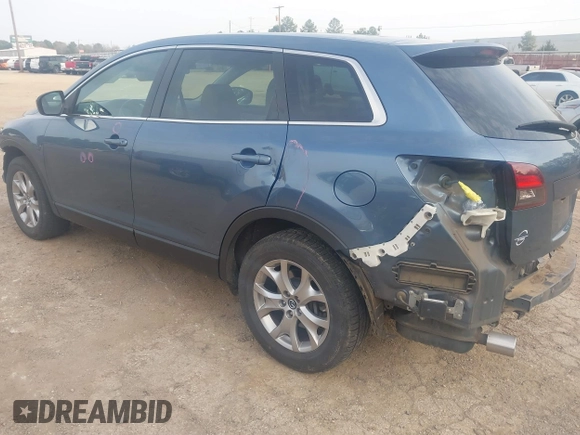 2014 Mazda CX-9 Touring with VIN JM3TB2CA0E0427183, listed as a IAAI auction lot 41734192 with 93,272 mi miles and . Bid and sale history available at carsss.com. Image 3.