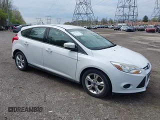 2014 Ford Focus SE with VIN 1FADP3K28EL291260, listed as a IAAI auction lot 42029753 with 98,686 mi miles. Bid and sale history available at carsss.com. Image 1.