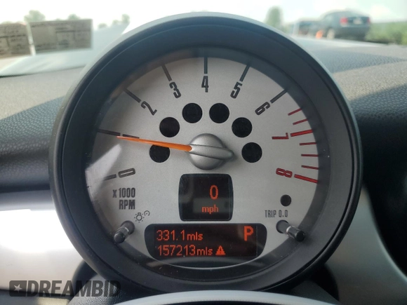 2011 MINI Hardtop with VIN WMWSU3C51BTX95581, listed as a Copart auction lot 60443995 with 157,213 mi miles and Salvage title. Bid and sale history available at DreamBid. Image 9.