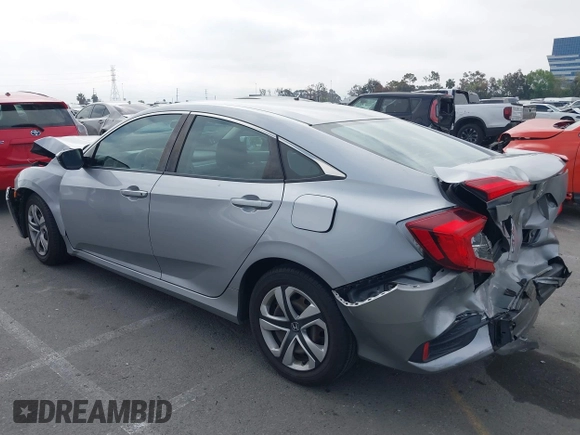 2017 Honda Civic LX with VIN 2HGFC2F5XHH562089, listed as a IAAI auction lot 42010207 with 99,809 mi miles and . Bid and sale history available at DreamBid. Image 14.