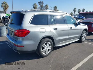 2016 Mercedes-Benz GL with VIN 4JGDF6EE1GA700391, listed as a IAAI auction lot 41309028 with 58,741 mi miles. Bid and sale history available at carsss.com. Image 4.