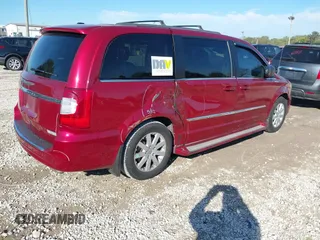 2014 Chrysler Town & Country Touring with VIN 2C4RC1BG9ER157652, listed as a IAAI auction lot 40449592 with 156,131 mi miles. Bid and sale history available at carsss.com. Image 4.