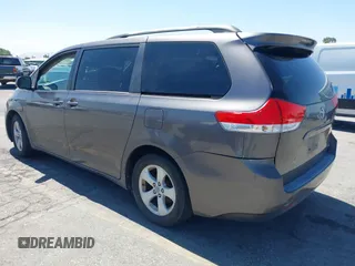 2011 Toyota Sienna LE AAS with VIN 5TDKK3DC4BS056872, listed as a IAAI auction lot 42643417 with 170,266 mi miles and . Bid and sale history available at DreamBid. Image 3.