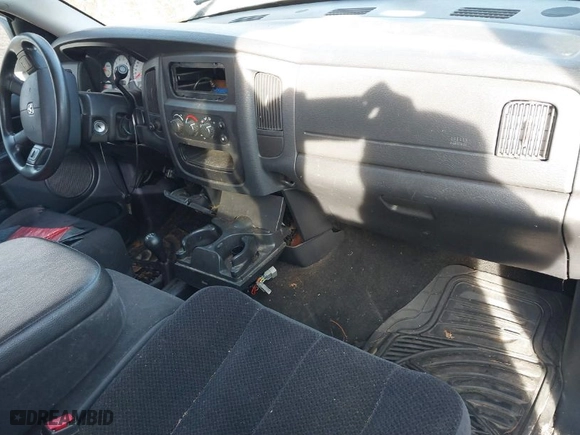 2005 Dodge Ram 1500 SLT with VIN 1D7HU18N65J570282, listed as a IAAI auction lot 41205833 with 216,122 mi miles. Bid and sale history available at carsss.com. Image 5.