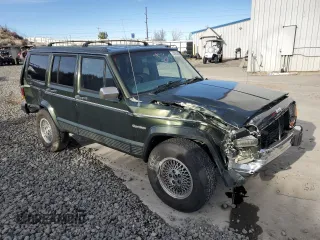 1995 Jeep Cherokee with VIN 1J4FN78SXSL617511, listed as a Copart auction lot 44650885 with 42,598 mi miles and Salvage title. Bid and sale history available at DreamBid. Image 4.