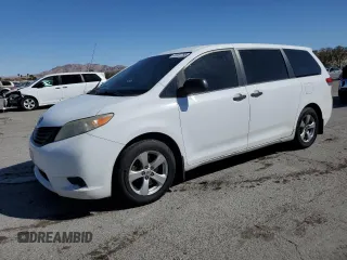 2012 Toyota Sienna with VIN 5TDZK3DC2CS244967, listed as a Copart auction lot 49787795 with 242,667 mi miles and Salvage Title. Bid and sale history available at carsss.com. Image 1.