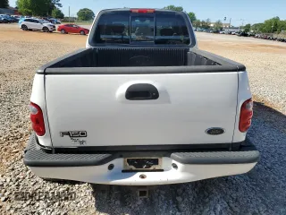 2003 Ford F-150 XL with VIN 1FTRX07W03KD12910, listed as a Copart auction lot 57864555 with Not provided miles and Salvage title. Bid and sale history available at DreamBid. Image 6.