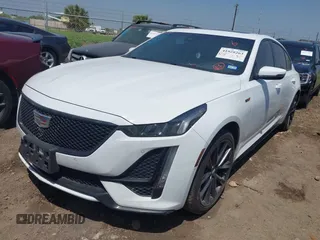 2021 Cadillac CT5 V-Series with VIN 1G6DV5RW2M0128157, listed as a IAAI auction lot 41928263 with 49,698 mi miles and . Bid and sale history available at DreamBid. Image 2.