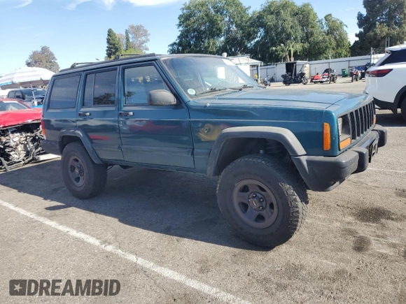 1997 Jeep Cherokee Sport with VIN 1J4FT68S4VL545385, listed as a Copart auction lot 49616325 with 239,798 mi miles and Salvage Title. Bid and sale history available at carsss.com. Image 4.