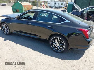 2024 Cadillac CT5 Premium Luxury with VIN 1G6DT5RK2R0131439, listed as a IAAI auction lot 42129787 with 1,801 mi miles and . Bid and sale history available at DreamBid. Image 3.