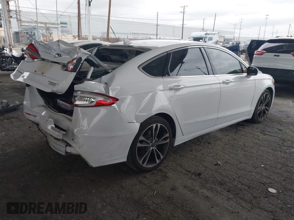 2019 Ford Fusion Titanium with VIN 3FA6P0K90KR236674, listed as a IAAI auction lot 42008633 with 99,737 mi miles and . Bid and sale history available at DreamBid. Image 4.
