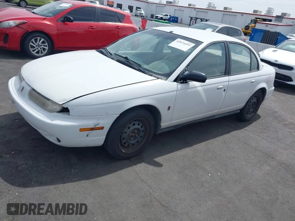 1998 Saturn SL z VIN 1G8ZJ5272WZ312413, wystawiony jako IAAI lot #41874493 z przebiegiem 229 200 mil mil oraz . Historia ofert i sprzedaży dostępna na DreamBid. Obrazek 2.