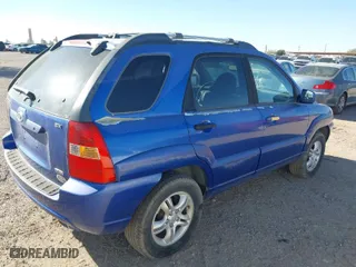 2006 Kia Sportage LX with VIN KNDJF723267158472, listed as a IAAI auction lot 41518202 with 123,178 mi miles. Bid and sale history available at carsss.com. Image 4.