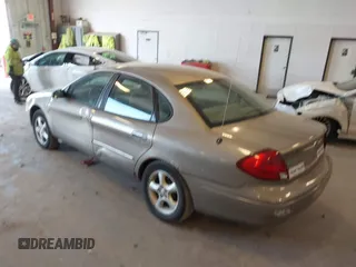 2003 Ford Taurus SES Standard with VIN 1FAFP55293G272187, listed as a IAAI auction lot 42154599 with 225,077 mi miles. Bid and sale history available at carsss.com. Image 3.