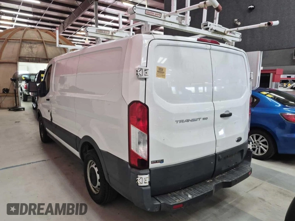 2016 Ford Transit Cargo with VIN 1FTYE1ZM1GKA06047, listed as a IAAI auction lot 42679265 with 124,601 mi miles and . Bid and sale history available at DreamBid. Image 28.