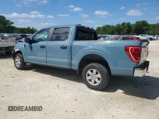 2023 Ford F-150 XL with VIN 1FTEW1C84PKD23395, listed as a Copart auction lot 51979205 with 43,001 mi miles and Non repairable. Bid and sale history available at DreamBid. Image 2.